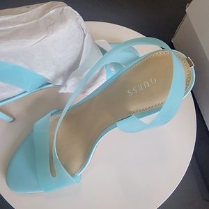 GUESS Women's Ferry Asymmetrical Lucite Clear Dress Sandals